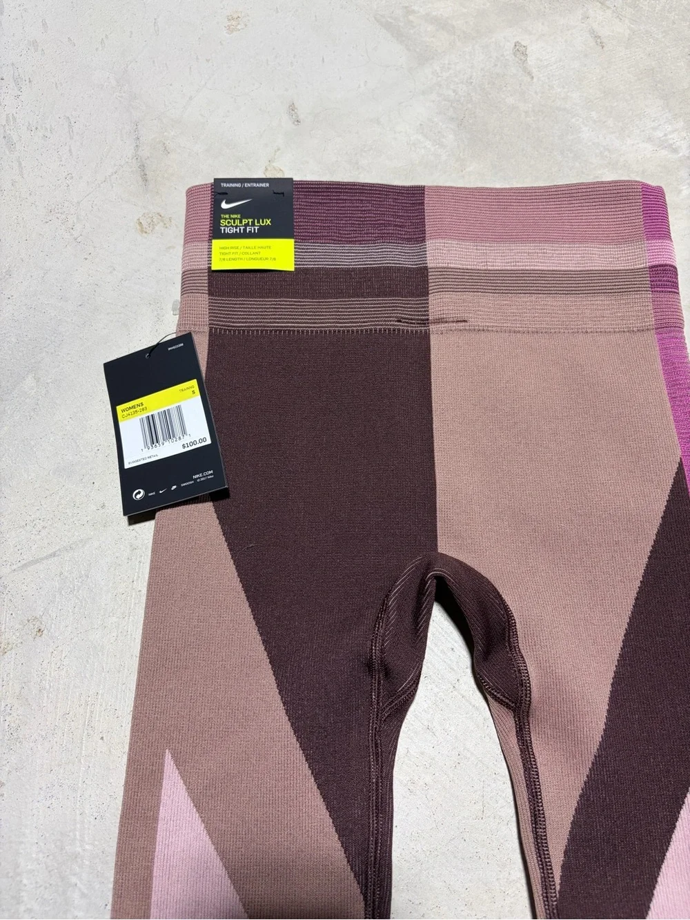 Nike women’s NWT Sculpt lux tight fit Pink brown leggings small MSRP$100